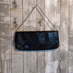 Daisy Fuentes: Black Faux Leather Clutch